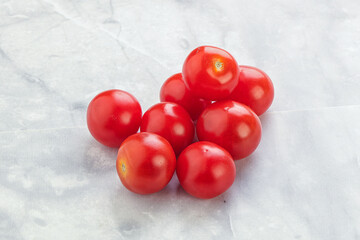 Ripe juicy cherry tomatoes heap