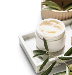 Obraz na płótnie Canvas Jar of natural olive cream on white background, closeup