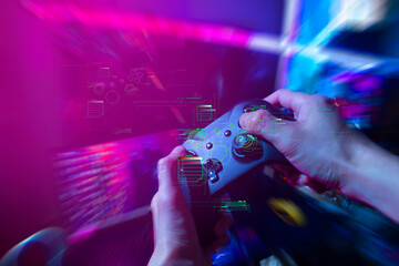 gamer playing the online game with joystick controller in neon glow dark cyberpunk room, gaming and e-sports challenge tournament streaming, streamer with analog device in living house © issaronow