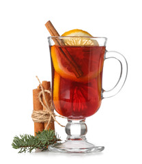 Glass cup of tasty mulled wine and cinnamon on white background