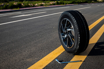 Wheel car, Car tire, Aluminum wheels or steel wheel isolated on street background. Car tires with a...