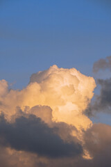 yellow clouds in the blue sky at sunset