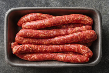 Fresh raw beef sausages. German sausages. Rinderbratwurst. Raw Beef bratwurst.
