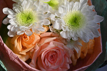 Pink roses and white gerberas in a beautiful bouquet 
