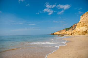 Maria Luisa beach with rock formation in Albufeira, Algarve, Portugal.
