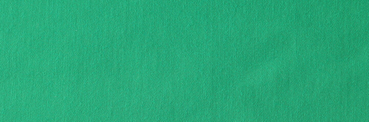 Poker table felt background in green color