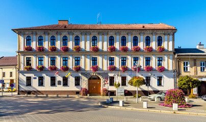 Colorful Town Hall Ratusz and local Council House at Rynek Market Square in historic old town quarter of Andrychow in Poland © Art Media Factory