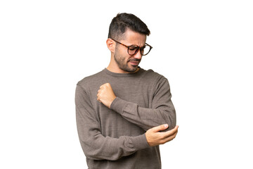 Young handsome caucasian man over isolated background with pain in elbow