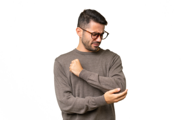 Young handsome caucasian man over isolated background with pain in elbow