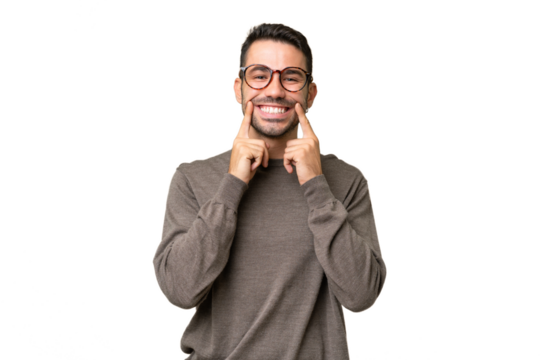 Young handsome caucasian man over isolated background smiling with a happy and pleasant expression