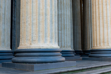 Historical granite columns of the cathedral, details, stripes, textured background