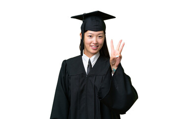 Young university graduate Asian woman over isolated background happy and counting three with fingers