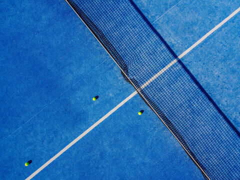 blue paddle tennis court, drone aerial view © Vic