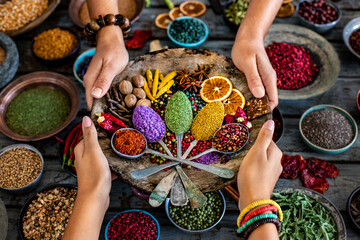 Various spices and dried fruits on the table.