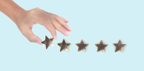 Obraz premium Rise on increasing five stars in human hand