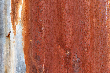Old rusty zinc wall. Rusty style metal sheet roof texture. Background and texture in vintage...