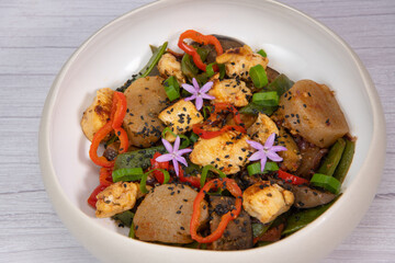 Recipe for grilled chicken breast, pre-cooked cassava paste, coconut bean, aubergine, onion, tomato, cebette. High quality photo