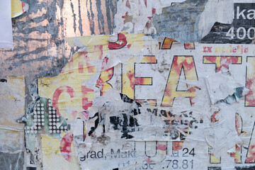 Fototapeta premium Torn street poster abstract background collage with ripped paper texture