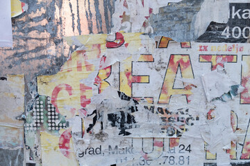 Torn street poster abstract background collage with ripped paper texture