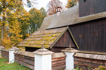 St. Nicholas in Polanka Wielka. Timber architecture with a log structure. The temple is covered with shingles and the facade is made of wooden boards in a vertical arrangement. Polanka Wielka, Poland