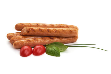 Grilled chicken hot dog sausages, close-up, isolated on white background.