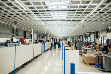 Business colleagues discussing together at industry