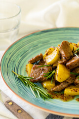 pork loin with apples, rosemary and mustard. Delicious and healthy dish.