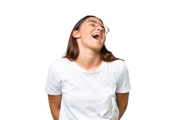 Young caucasian woman isolated on green chroma background laughing