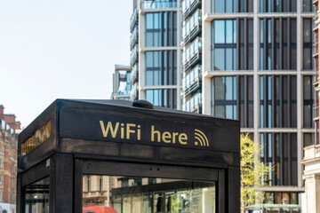 UK, England, London, Modern phone booth with free Wi-Fi