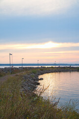 Sunset in Sweden at the harbor of lake Vaettern. Landscape shot in Scandinavia.