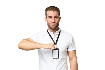 Young caucasian man with ID card isolated on green chroma background proud and self-satisfied