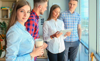 Group of buisness people working on tablet