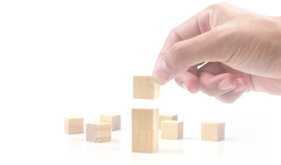 Wooden cubes in hand with copy space for input wording
