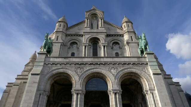 Paris, France. 04-01-2022. Beautiful facade of the Sacre Coeur Basilica building. Historic architectural structure. City of Paris. Titl 4K