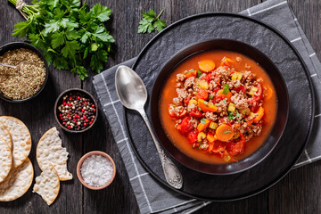 Hamburger Soup with barley and vegetables in bowl