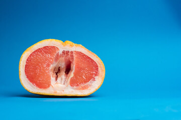 grapefruit banana, woman's hand