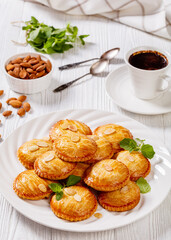 almond cookies on white plate, top view