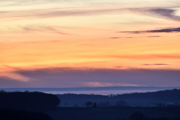 Fototapeta na wymiar Beautiful orange clouds at twilight