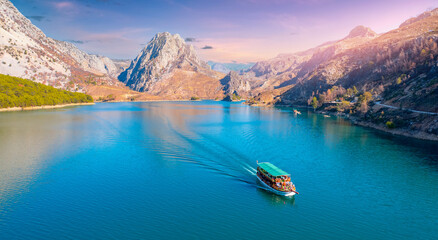 Green Canyon Turkey with tourist ship, Manavgat Mountain Lake Aerial top view