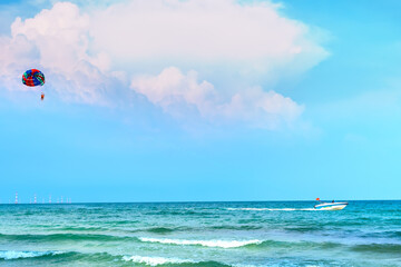 Beautiful tropical beach on the pearl island of Phu Quoc, Vietnam. The beach is clean, clear and blue, with fine sand stretching to attract tourists to have fun at the weekend
