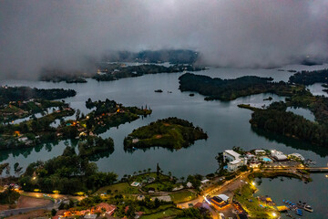 Fototapeta premium Guatape Rock in Columbia Aerial Drone Video