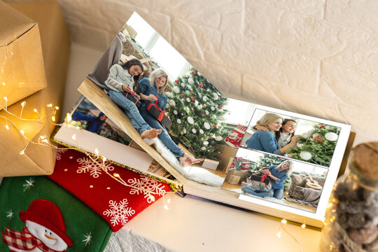 christmas and young family in retro photo book