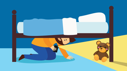 Dad with a flashlight looking for a teddy bear under the bed