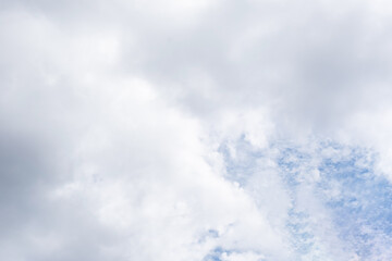 Fototapeta premium Cloudy blue sky with white cloud in daytime, space for text on background.