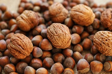 Hazelnut and walnut composition,  organic natural food. Close up.