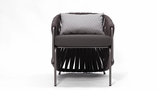 Stylish designer chair with upholstered cushion on a white background. Insulated 