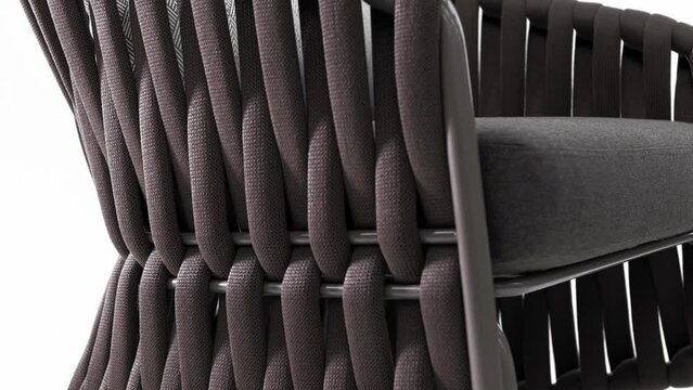 Beautiful rope weave on the side and back of a modern exterior chair. White background 