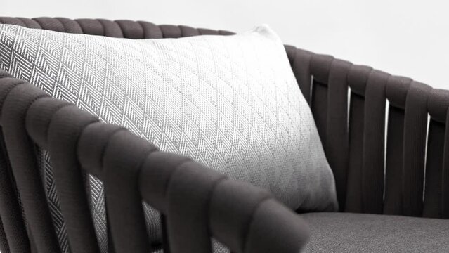 Modern designer chair with cushion on white background. Close-up 