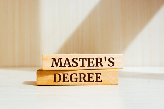 Wooden blocks with words 'Master's Degree'.