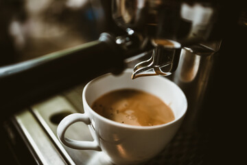 espresso machine in coffee shop counter offering freshly brewed coffee. coffee maker concept.